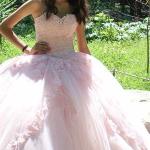 The blue dress is brand new it has the tag is size 2 the pink one is size 0